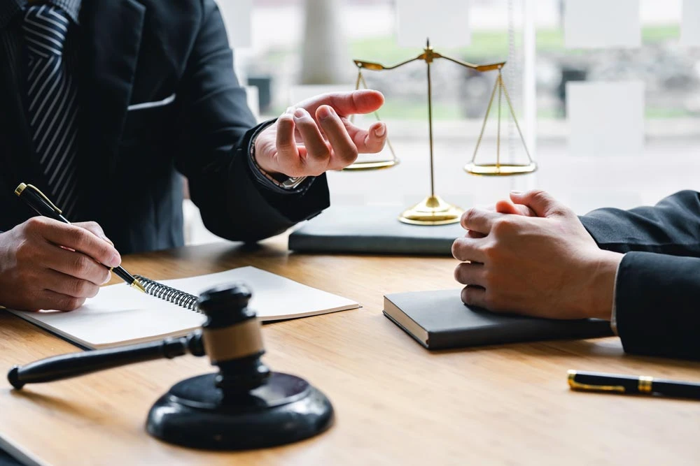 Attorney or Male judge consult or discuss contract papers with Businessman client in the office, law, and Legal services concept
