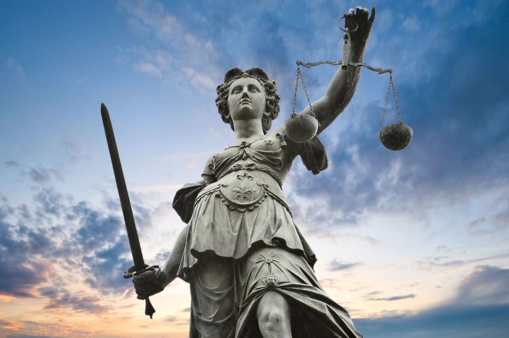 justice statue with sword and scale