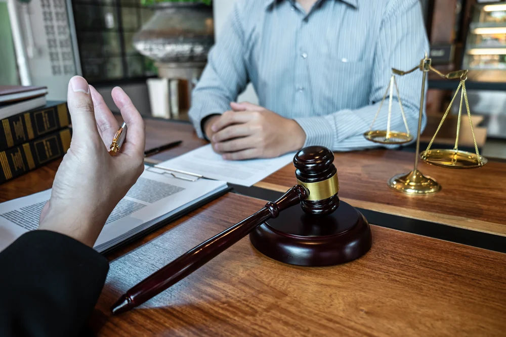 Professional male lawyer or counselor discussing negotiation legal case