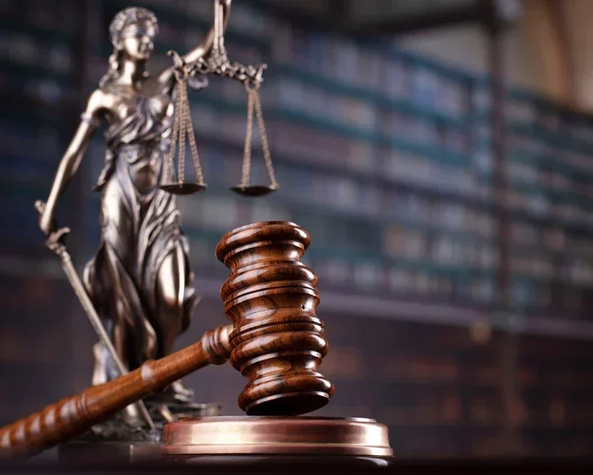 Judge's gavel on library background. Law and justice concept