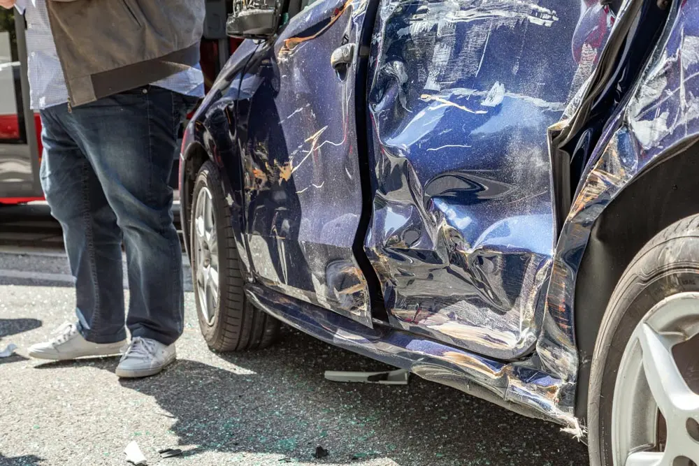 blue car damaged by crash accident